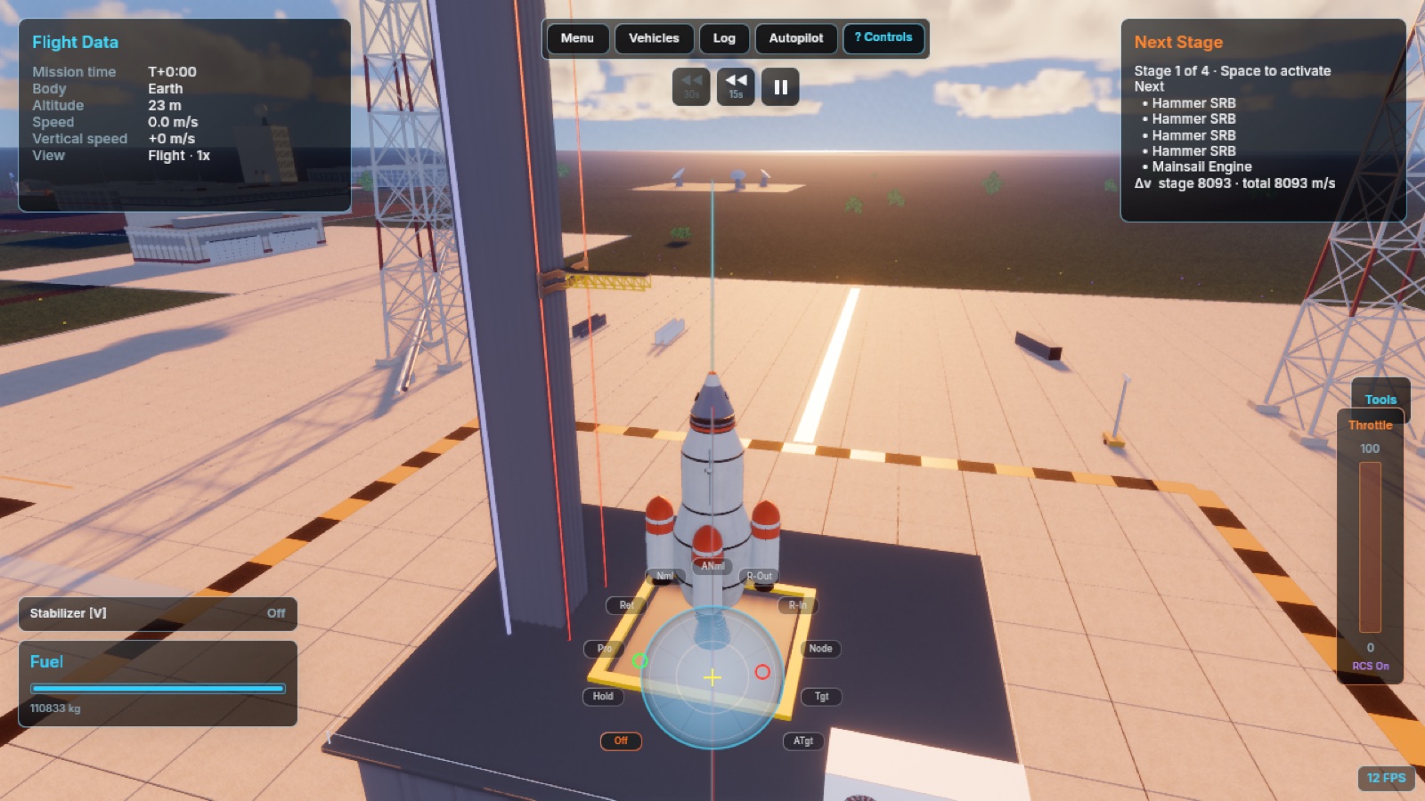 A rocket on the launch pad at the space center, engines lit